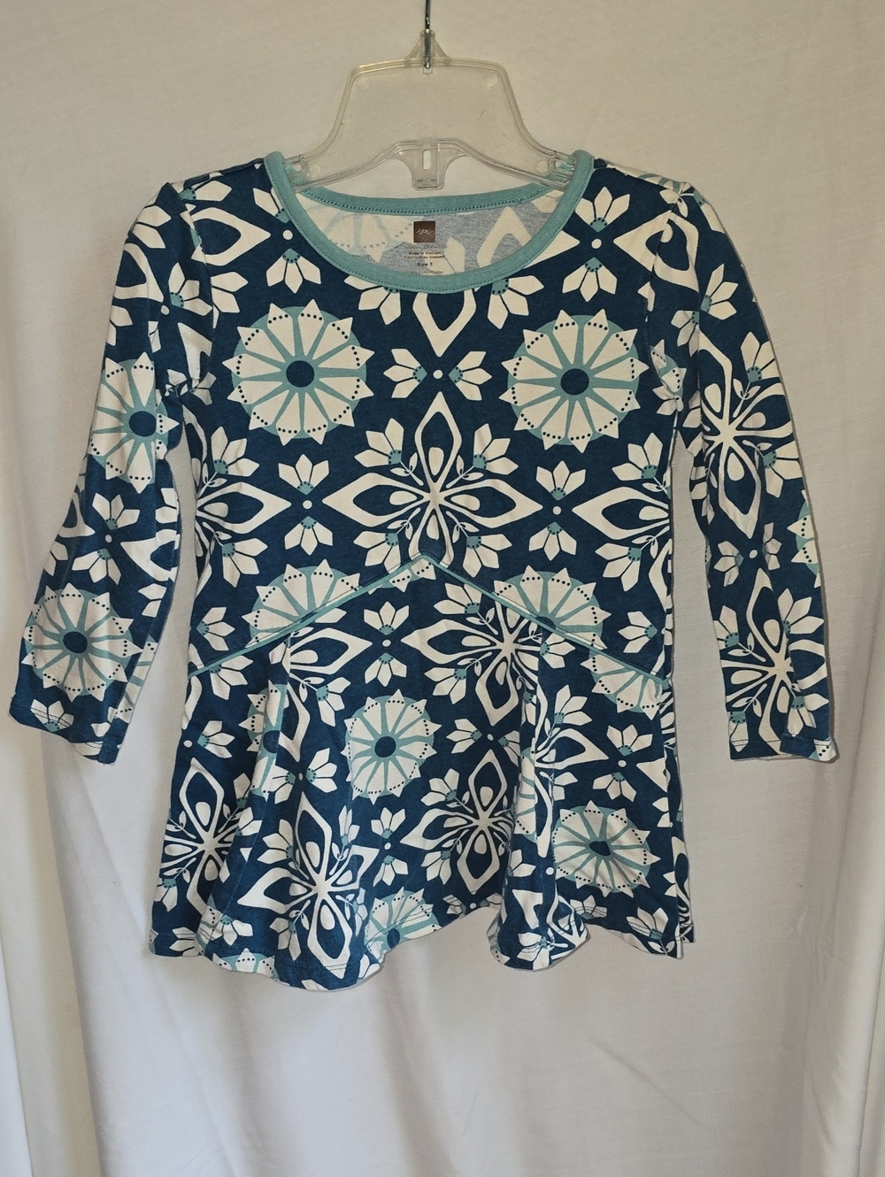 Tea Collection Navy Blue Floral Peplum Tunic with Aqua Accents